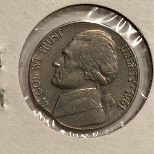 1961 Nickel with a ragged clipped planchet error